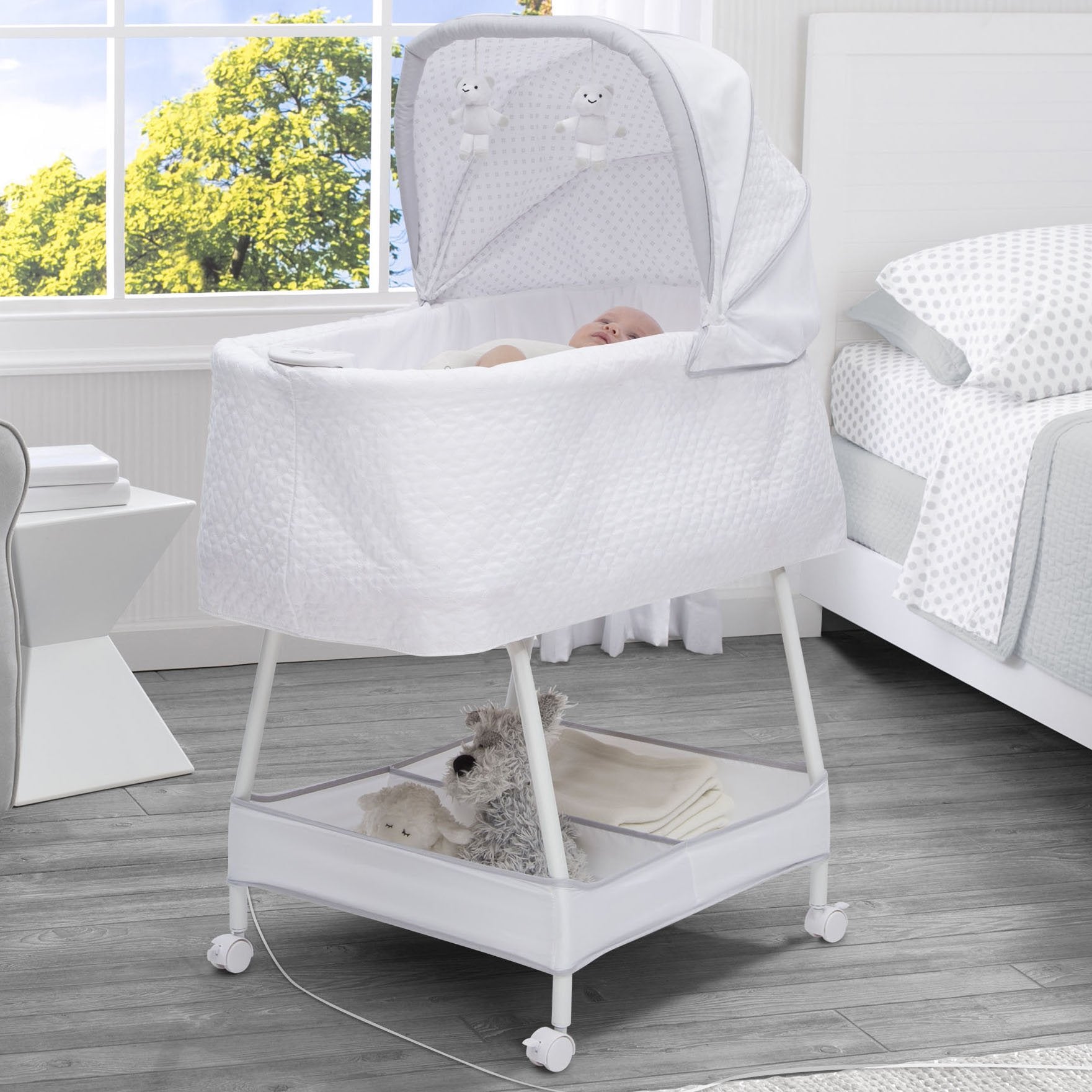 Silent Auto Gliding Elite Bassinet Odyssey Delta Children