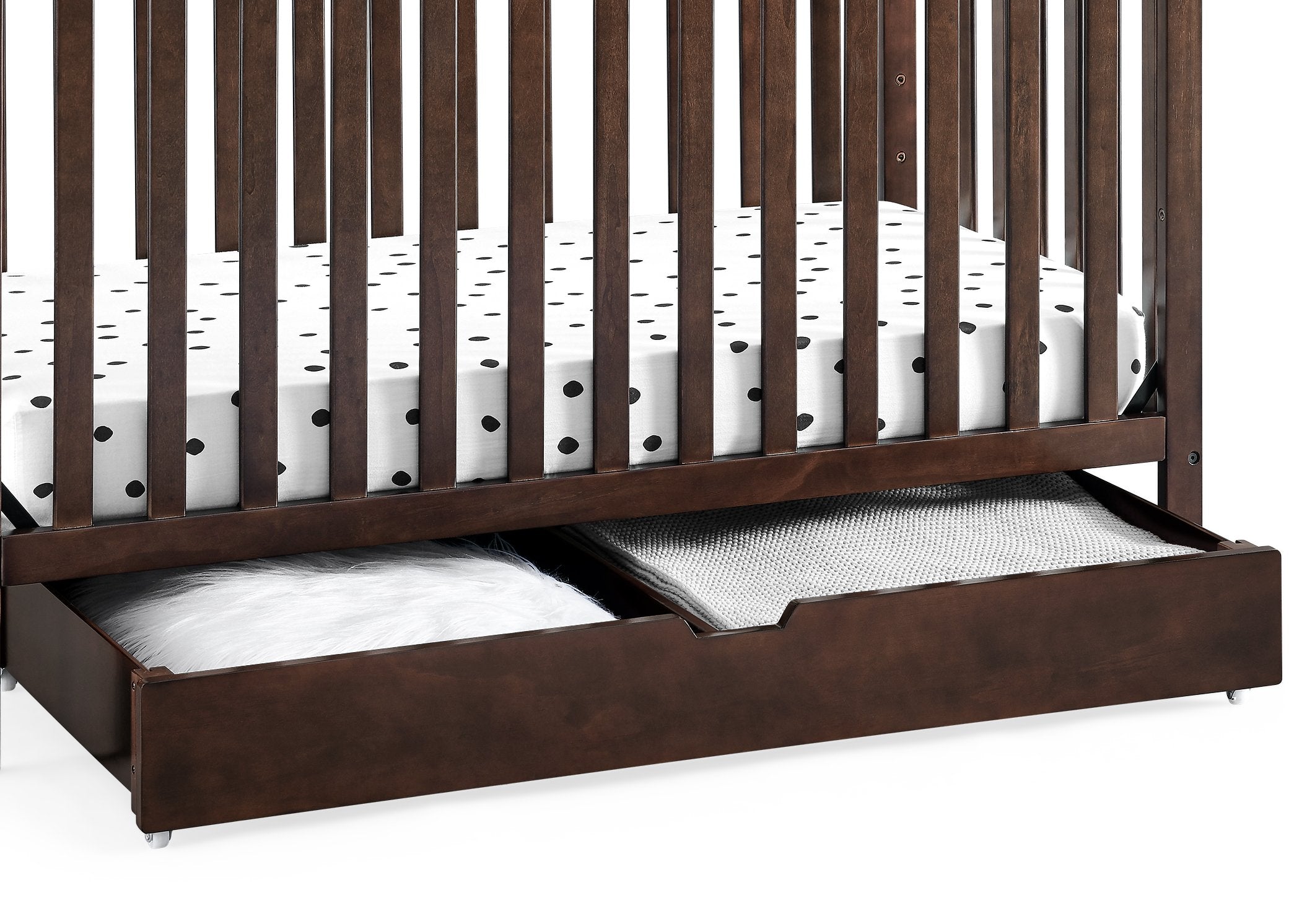 Crib with bottom drawer top