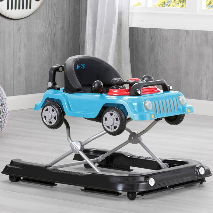 A green Jeep Wrangler baby walker designed for toddlers, featuring a toy tray and interactive features. 2-Jeep® Classic Wrangler 3-in-1 Grow With Me Walker