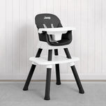 A black and white Jeep high chair with a white tray and seat, set against a white paneled wall and gray carpet. - Black (001) - Accessories