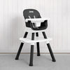 A black and white Jeep high chair with a white tray and seat, set against a white paneled wall and gray carpet. 33-Milestone 6-in-1 High Chair