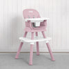 A pink and white Jeep high chair with a matching tray table, set against a white wood-paneled wall and gray carpet. 42-Milestone 6-in-1 High Chair