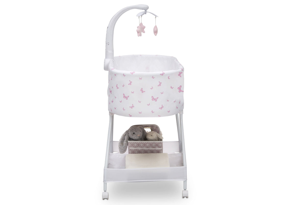 Baby changing table with bassinet and toys on a white background