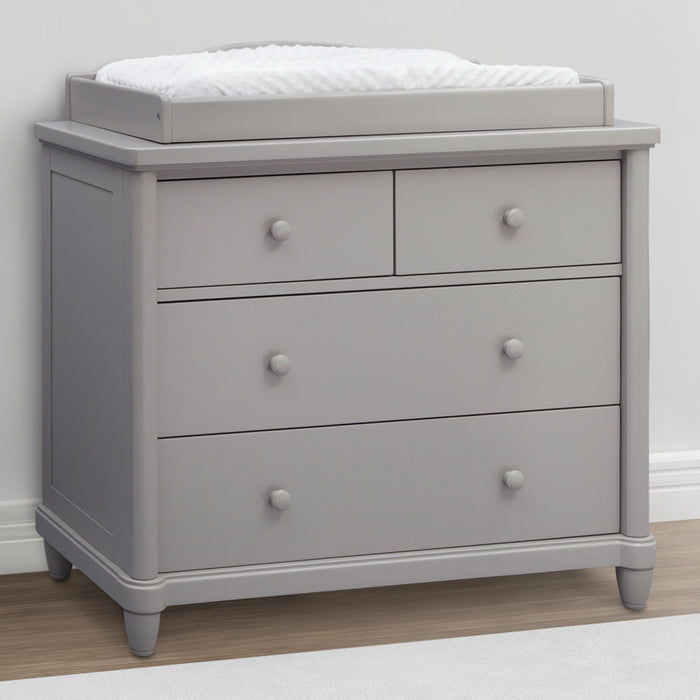 A gray 4 drawer dresser with a changing top pad on top, set against a white background. 0-Belmont 4 Drawer Dresser with Changing Top