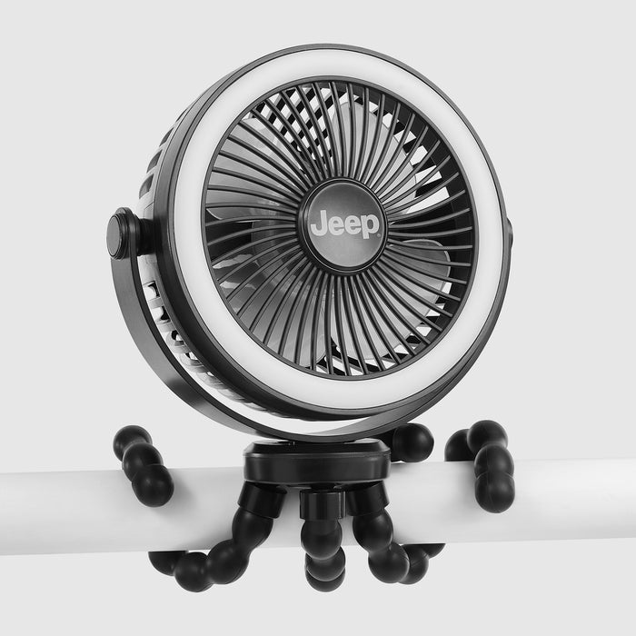 A black Jeep portable fan with a circular white LED light ring, mounted on a flexible black tripod stand against a light gray background. 0-Portable LED Stroller Fan with Light & Flexible Legs