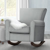 Gray rocking chair with a white pillow in a room with large windows. 19-Lancaster Rocking Chair featuring LiveSmart Fabric by Culp
