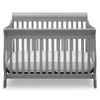 Gray crib with a white mattress on a white background 42-Canton 4-in-1 Crib
