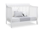 White crib with gray and white bedding on a white background 34-Canton 4-in-1 Crib