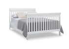 White crib with gray bedding on a white background 35-Canton 4-in-1 Crib
