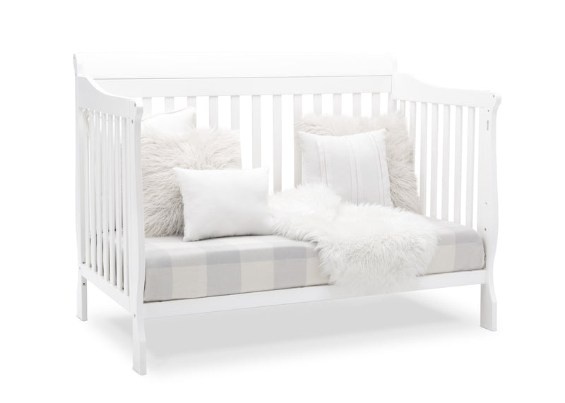 White crib with white bedding and gray mattress cover on a white background 37-Canton 4-in-1 Crib