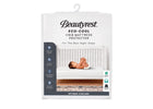 Beautyrest Eco-Cool Crib Mattress Protector in its retail packaging, featuring a white crib mattress protector with a graphic of a baby sleeping on it. 16-Eco-Cool Cooling Crib Mattress Protector