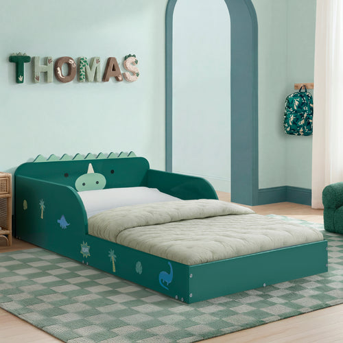 Children's bedroom with a green dinosaur-themed bed, decorative letters on the wall, and a backpack.