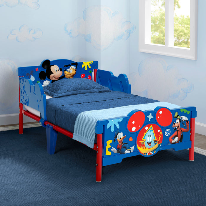 Children's bed with cartoon character design in a room with blue walls and a window. 0-Mickey Mouse 3D Toddler Bed