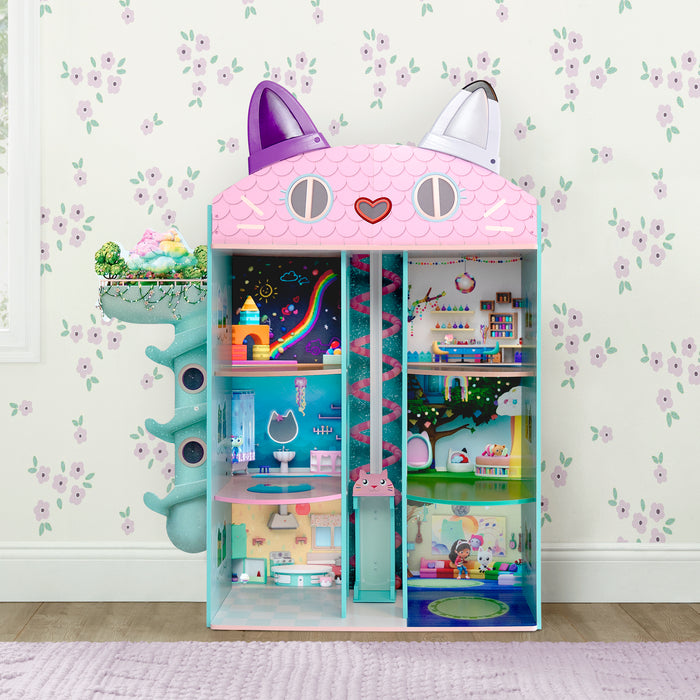 Children's toy wardrobe with cat design in a room with floral wallpaper. 1-Gabby’s Dollhouse Purrfect Playhouse