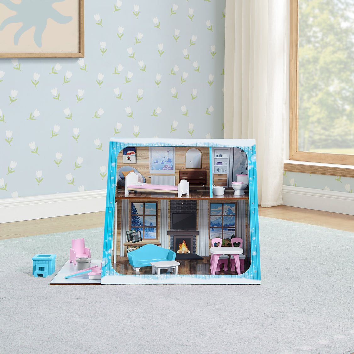 Toy dollhouse in packaging with furniture on a carpeted floor