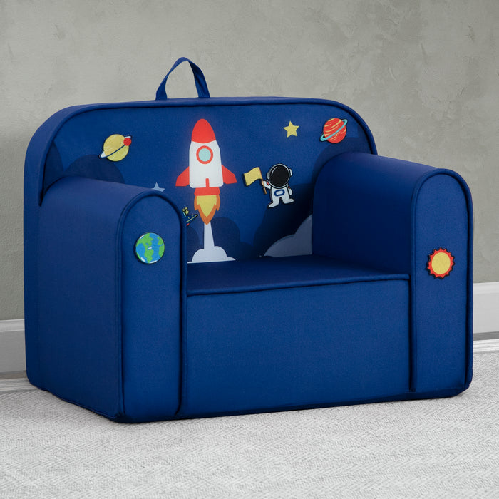 A blue foam chair with interchangeable patches featuring space-themed graphics, placed in a room with a window and toys in the background. 0-Mix & Match Cozee Kids Chair with Interchangeable Patches