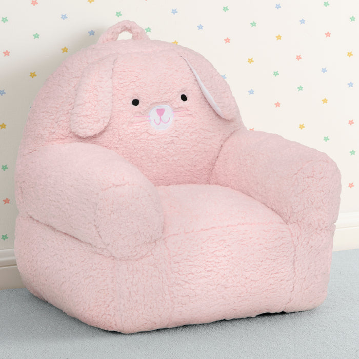 Pink elephant-shaped bean bag chair on a light blue surface with a star-patterned wall in the background. 1-Bunny Cozee Buddy Chair