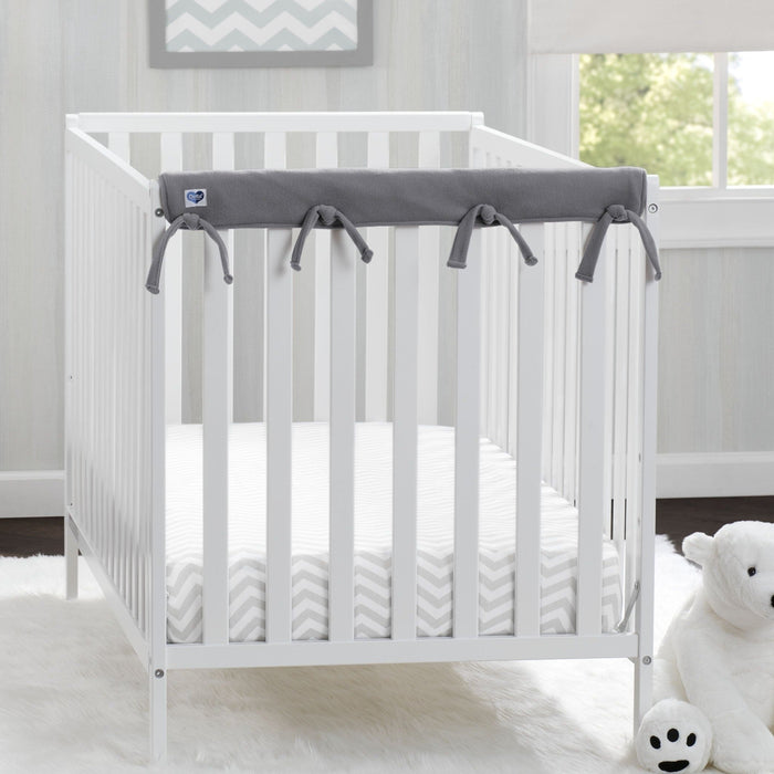 Delta Children Grey (026) Waterproof Fleece Crib Rail Covers/Protectors for Short Side Rails, 2 Pack, Lifestyle View 1-Waterproof Fleece Crib Rail Covers/Protectors for Short Side Rails, 2 Pack