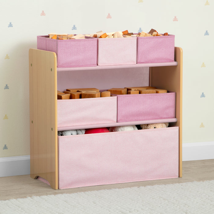 Toy storage unit with pink and white bins containing toys on a light wooden frame. 0-GapKids 6 Bin Toy Organizer