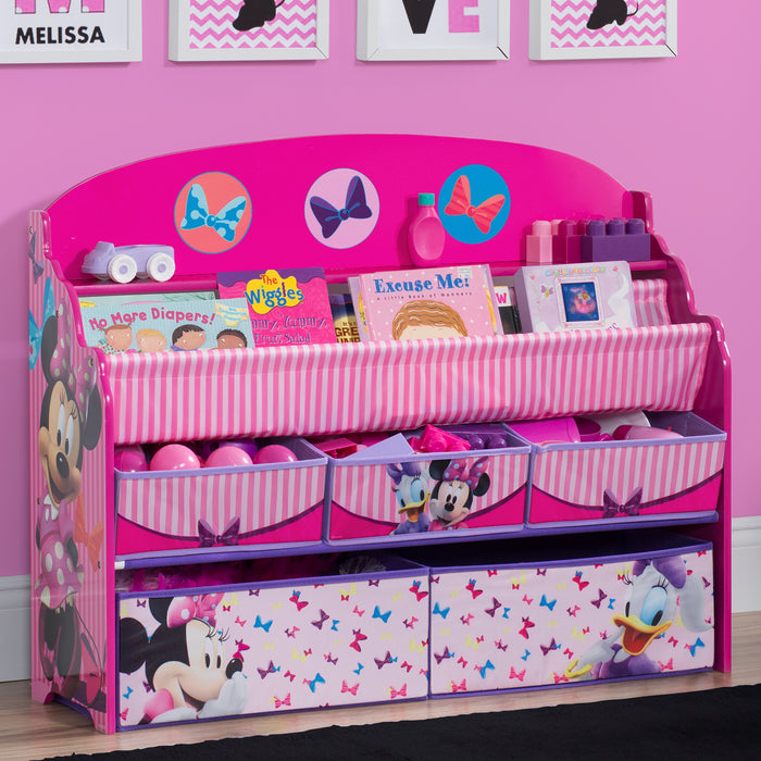 TB84980MN 1061 Deluxe Multi Bin Toy Organizer with Storage Bins Lifestyle 101 2-Minnie Mouse Deluxe Book & Toy Organizer