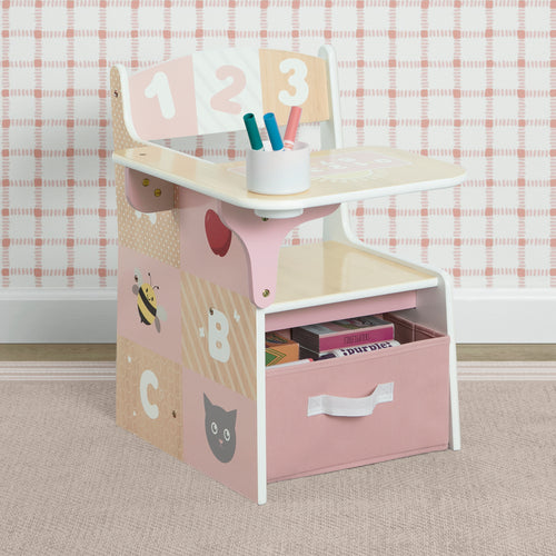 Children's learning desk with storage drawers and educational items on a checkered background