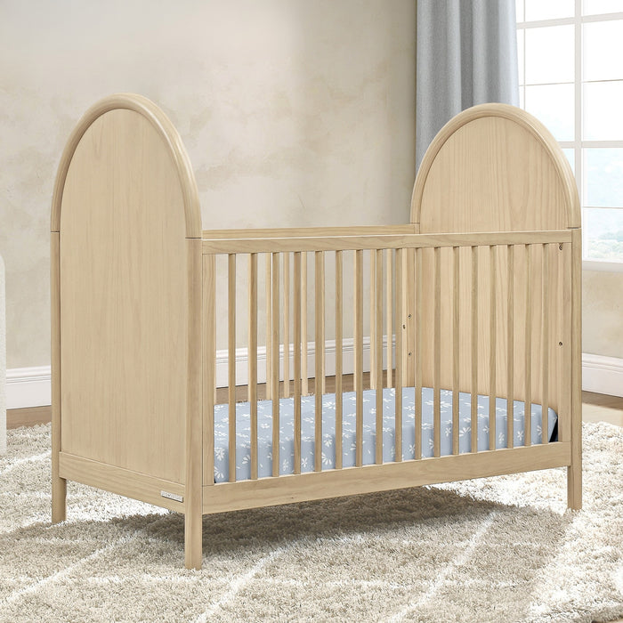 Beige crib in a room with a neutral color scheme 1-Vivi 4-in-1 Convertible Crib