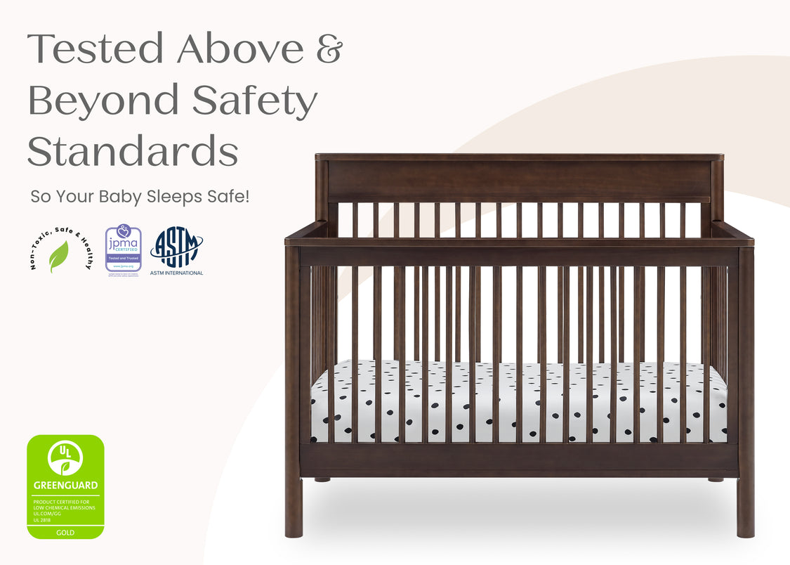 Wooden crib with safety certification logos on a white background