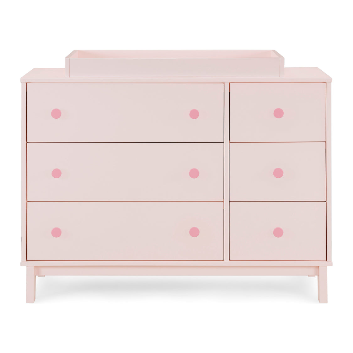 Pink dresser with pink knobs on a white background