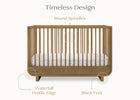 Wooden crib with features highlighted on a white background 26-Rhodes 4-in-1 Convertible Crib
