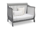 Gray crib with white mattress and pillows on a white background 46-Canton 4-in-1 Crib