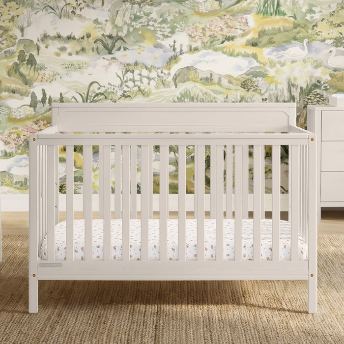 White crib in a nursery with floral wallpaper 3-Isabelle 6-in-1 Convertible Crib