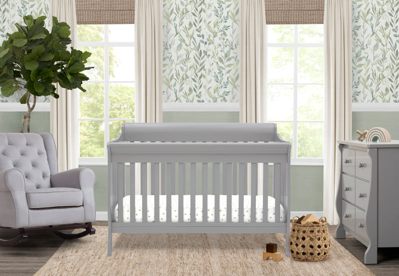 Nursery room with gray crib, gray chair, and white dresser. 52-Canton 4-in-1 Crib