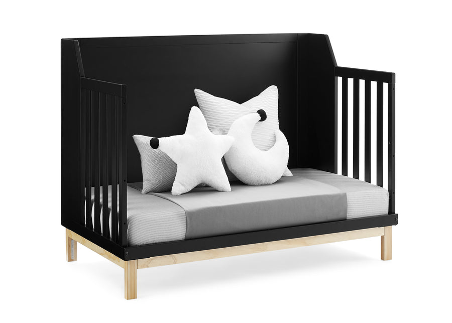 Black crib with white and gray pillows on a white background 14-babyGap Oxford 6-in-1 Convertible Crib