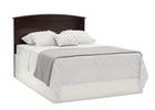 Bed with dark wooden headboard, gray bedding, and white mattress on a white background 21-Archer 4-in-1 Convertible Crib