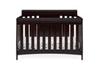 Dark wood crib with white bedding on a white background 10-Richmond 6-in-1 Convertible Baby Crib