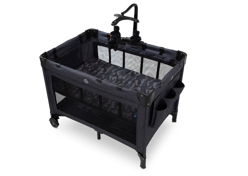 Black baby crib with wheels on a white background