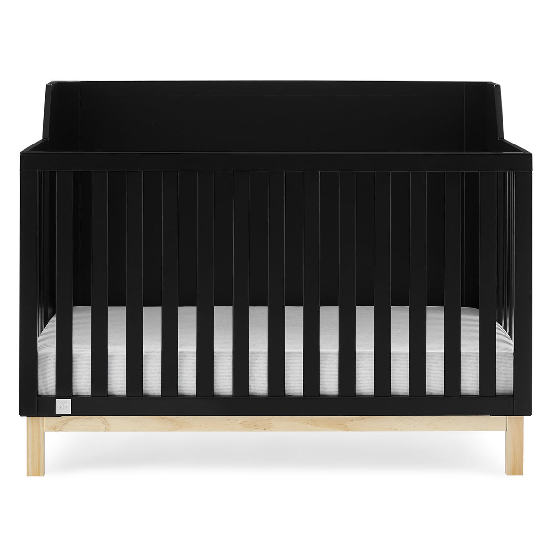 Black crib with white mattress on a white background