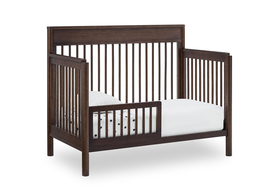Wooden crib with white mattress on a white background 14-Remy 6-in-1 Convertible Crib