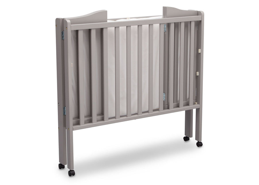 Delta Children Grey (180) Portable Folding Crib with Mattress, angled folded view b5b 11-Portable Folding Crib with Mattress