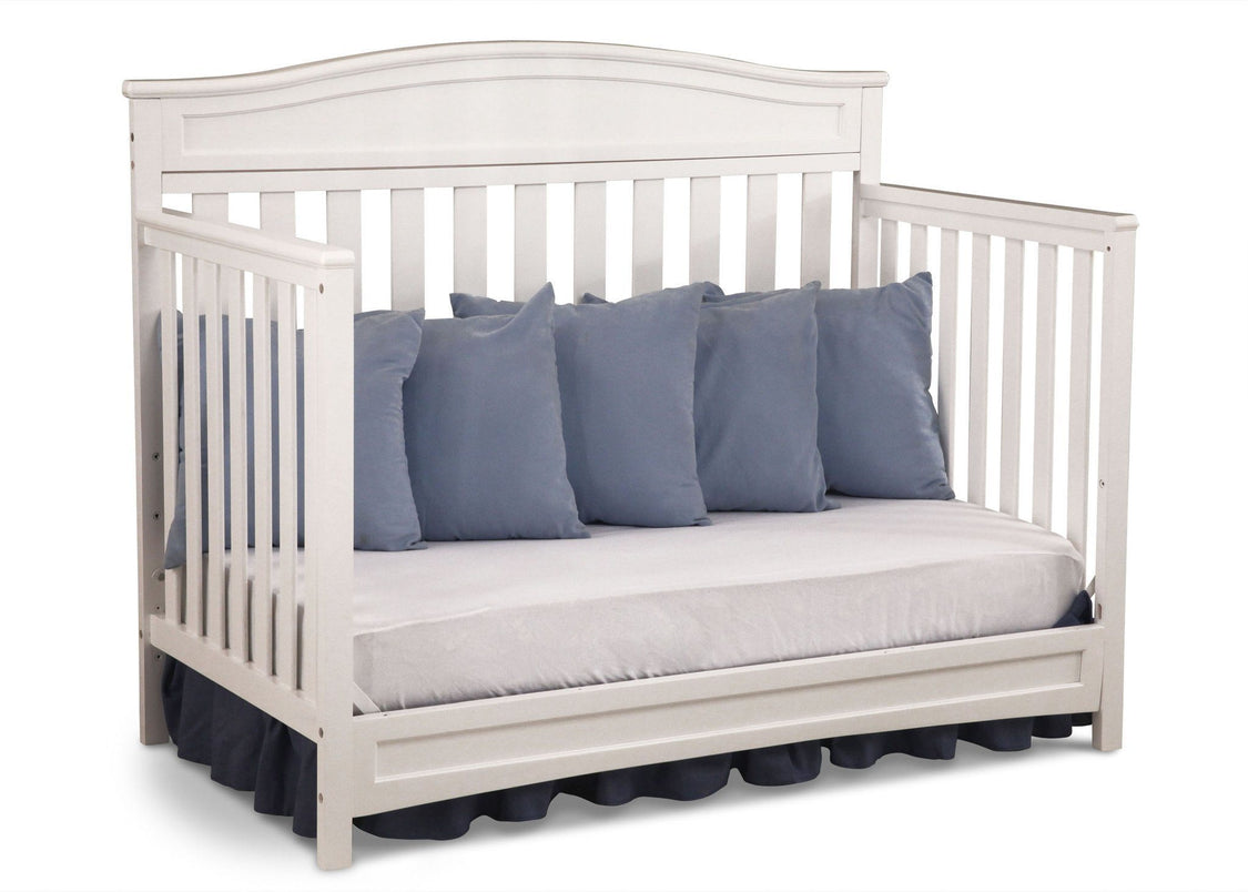 Delta Children White (100) Essington 4-in-1 Crib angled conversion to daybed a5a 