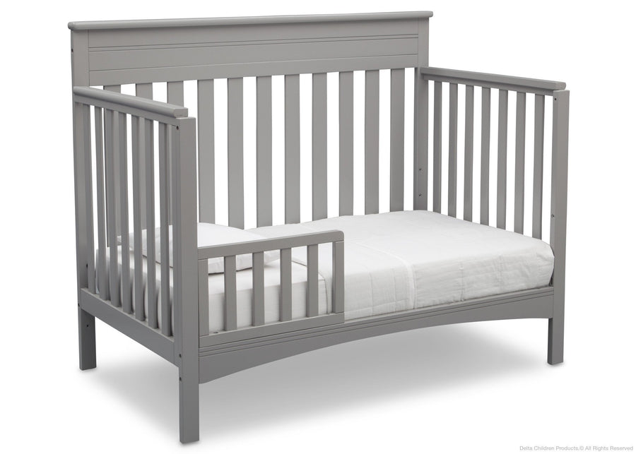 Delta Children Grey (026) Fabio 4-in-1 Crib Side View, Toddler Bed Conversion with Toddler Guardrail c4c 8-Fabio 4-in-1 Crib