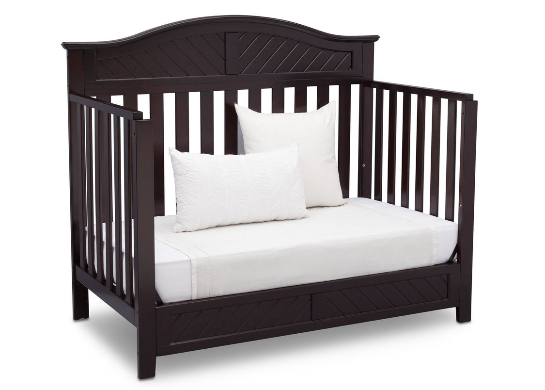 Delta Children Dark Espresso (958) Bennington Elite Curved 4-in-1 Crib angled conversion to daybed b5b