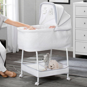 Silent Auto Gliding Elite Bassinet Basketweave Delta Children