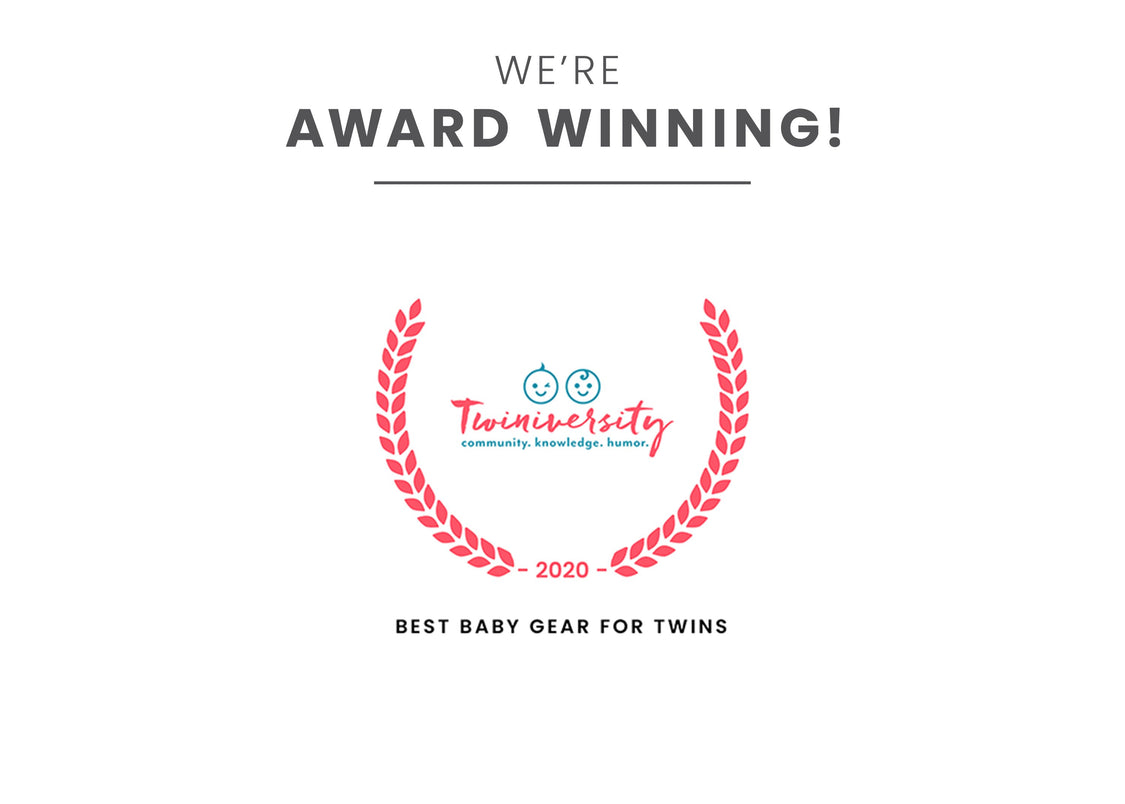 Little Folks by Delta Children Aqua Geo (2040) Twin EZ Fold Ultra Compact Double Bassinet Badge