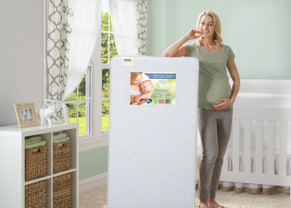 Delta Children Glimmer Stars Crib and Toddler Mattress Lifestyle View a0a