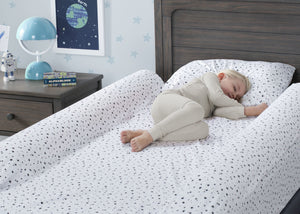 Delta Children Foam Bed Rails/Bumpers with Water-Resistant Covers and Non-Slip Bottoms for Toddlers & Kids – 2 Pack, Lifestyle View with Model White (100) 0