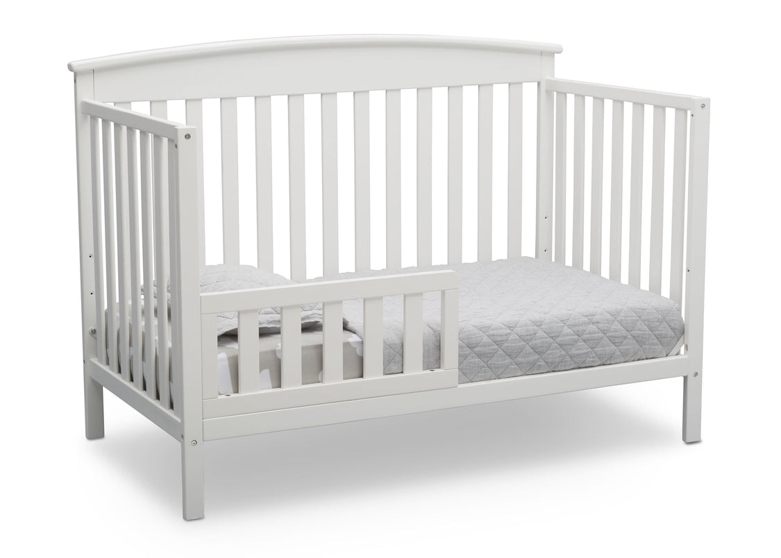 Delta Children Bianca White (130) Finley 4-in-1 Convertible Baby Crib Toddler Bed Angled View a5a
